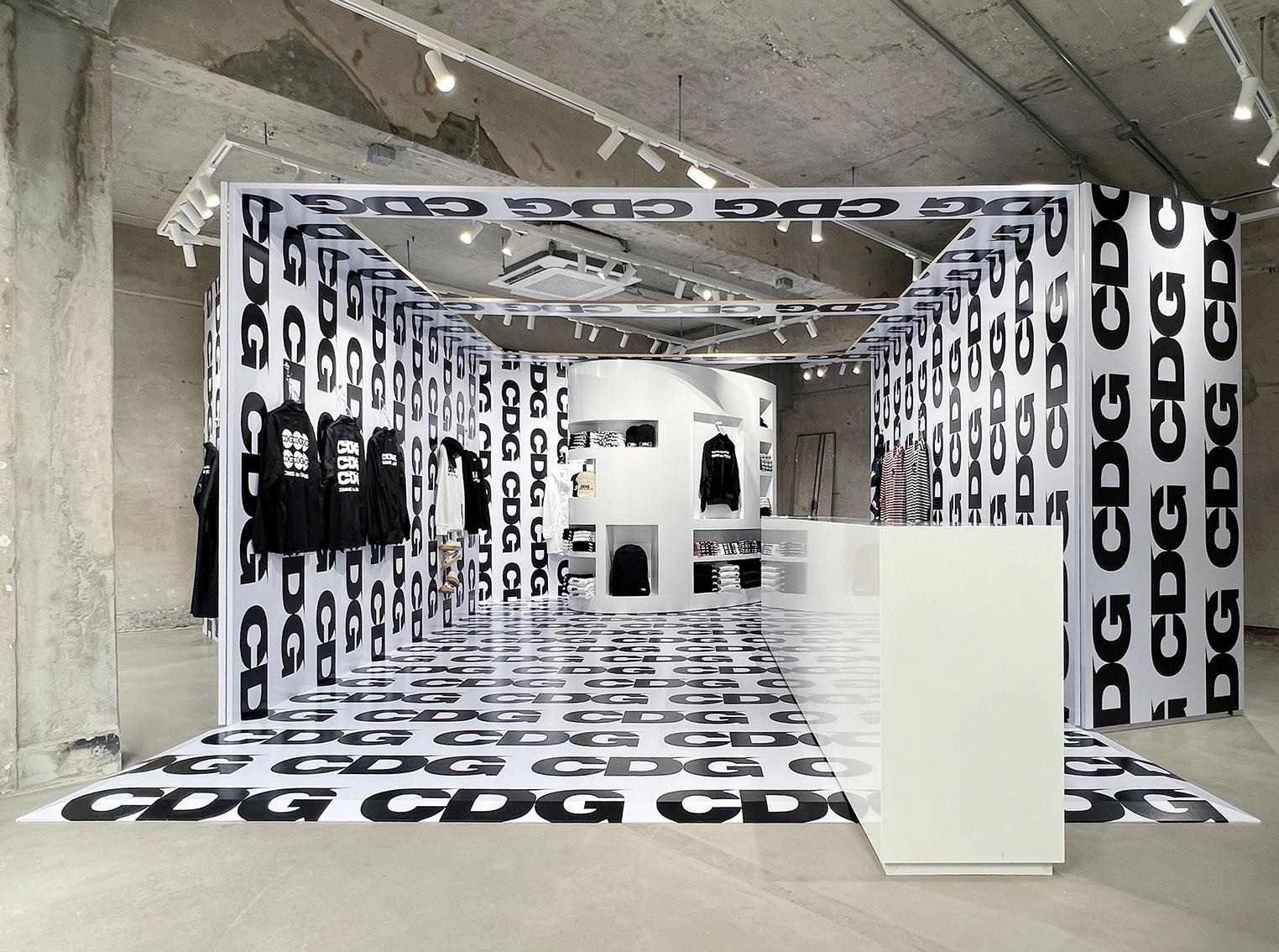 The interior of the CDGCDGCDG pop-up store is filled with the famous logo.