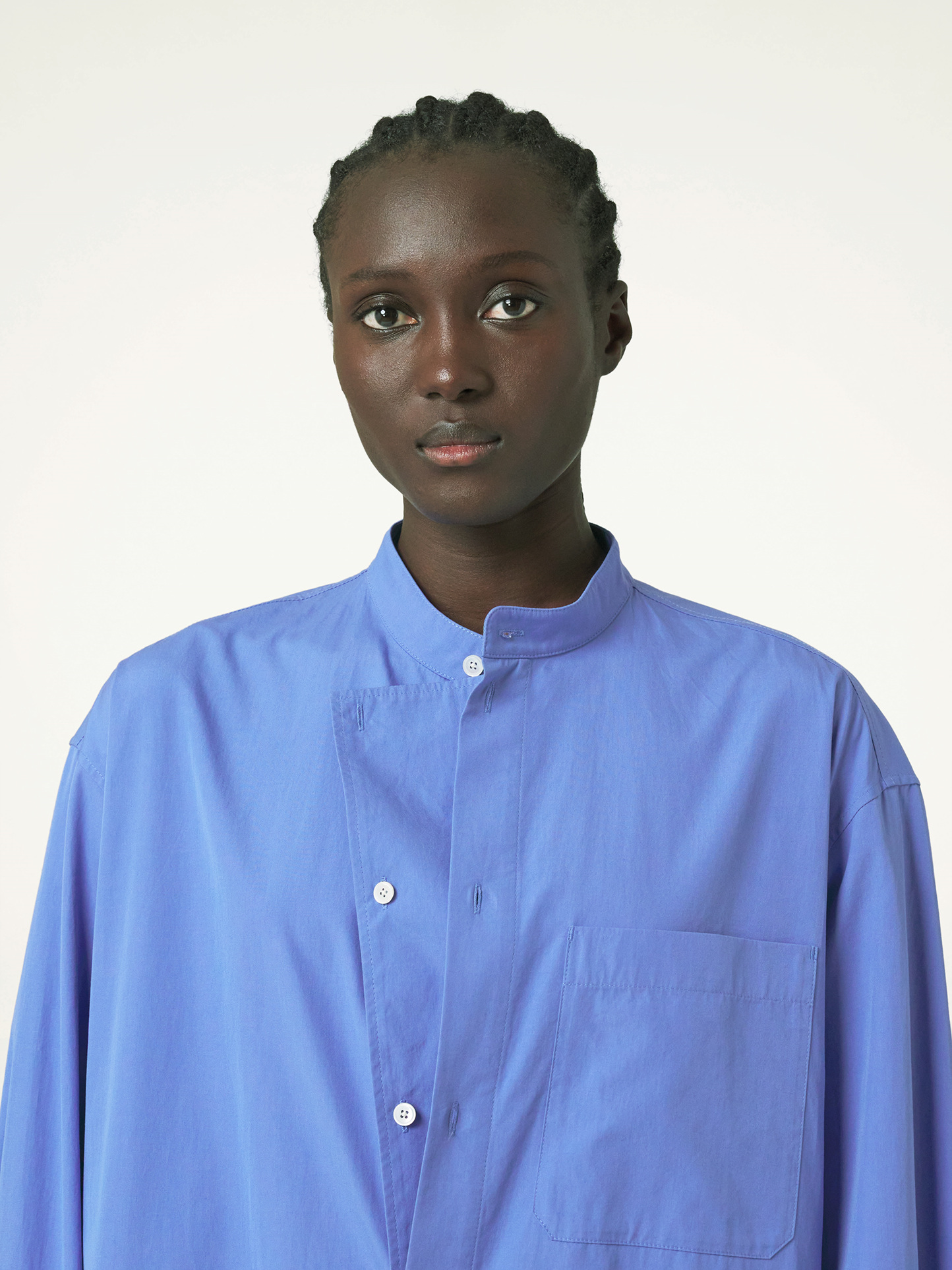 Lemaire’s cerulean shirt stands out from the crowd.