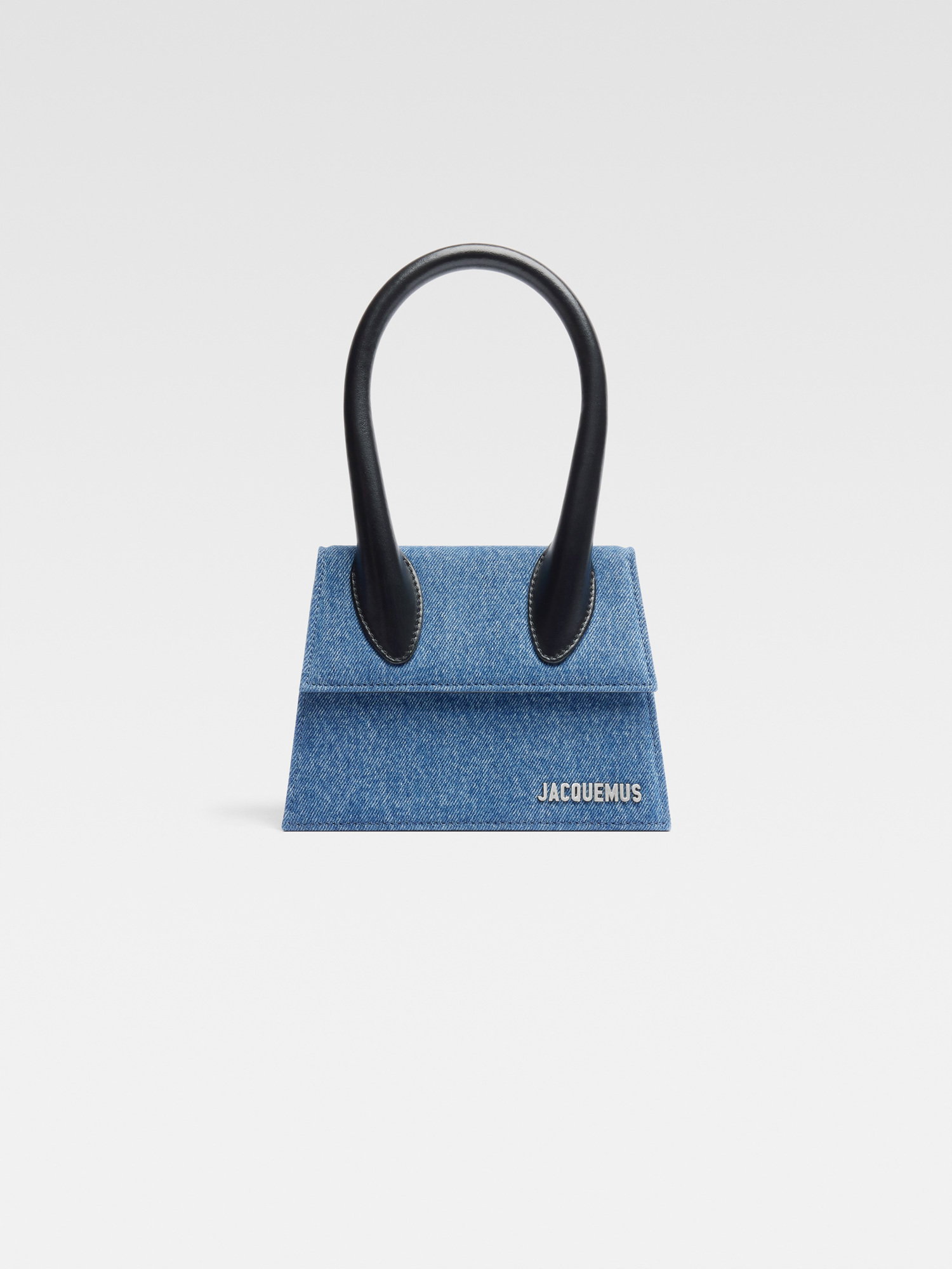 This distinctive Jacquemus bag comes in denim blue.