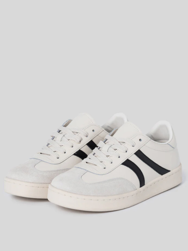 Simple white Beanpole sneakers with two basic stripes along the side of the shoes.