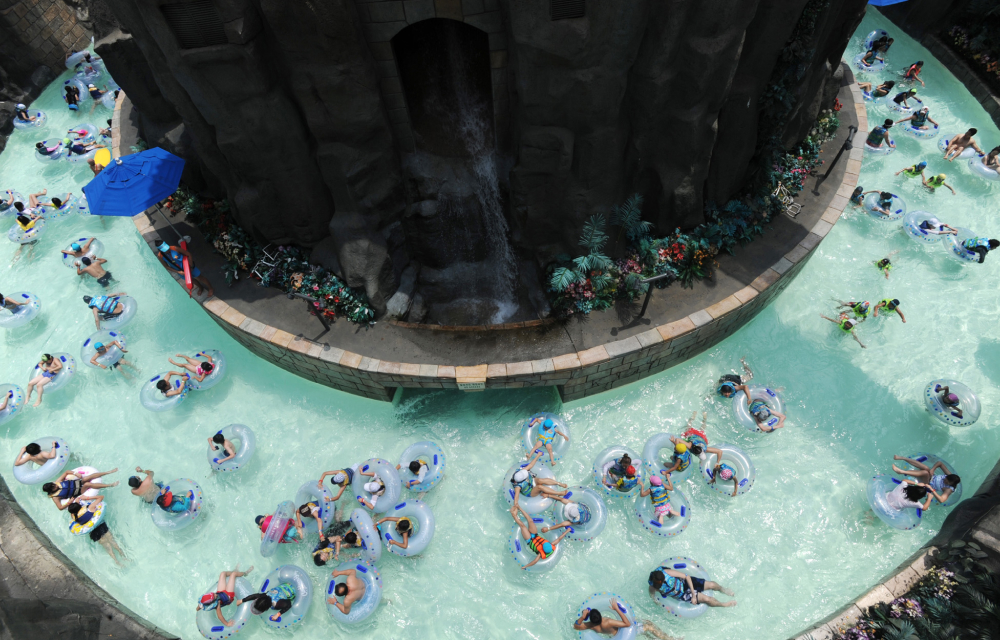 Water park goers float in tubes along the lazy river indoors at Korea's Caribbean Bay