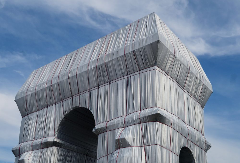 Paris' Arc de Triomphe hidden beneath 25,000 square meters of fabric and 7,000 meters of rope in a 2021 environmental art installation by artists Christo and Jeanne-Claude.