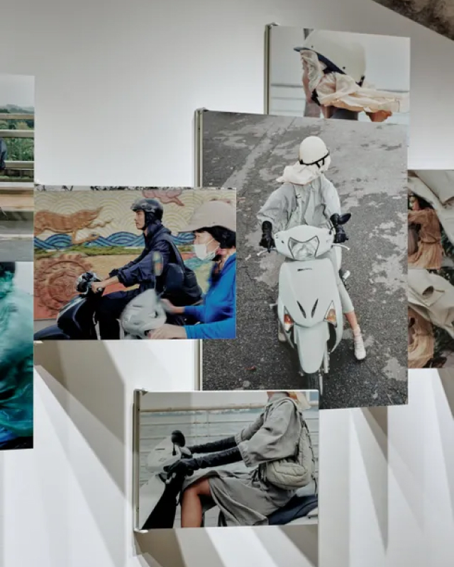 A selection of photographs on display during an exhibition in a clothing store in South Korea, the subjects of the images are riding motorcycles in Vietnam.