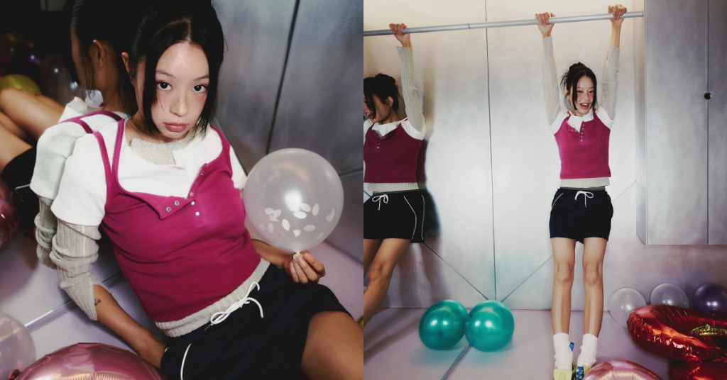 Left image: Jisoo Seo sits on the floor of a mirrored room surrounded by balloons, wearing a layered magenta tank over a white and beige top with black drawstring shorts. Right image: Jisoo hangs onto a bar in a minimal silver room, styled in the same outfit.