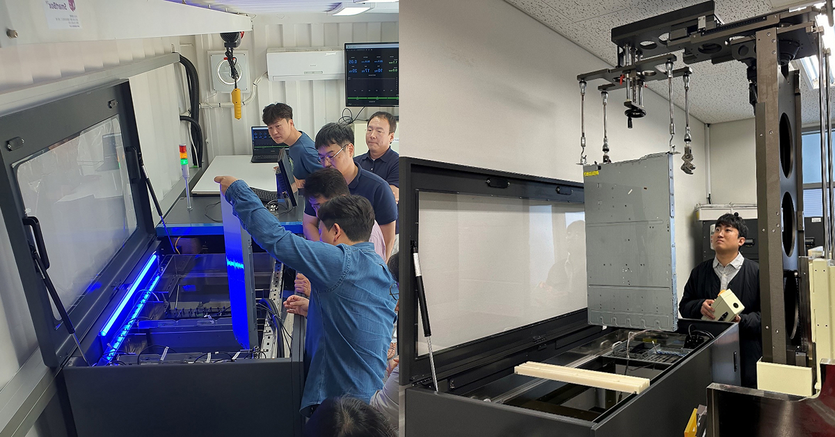 Engineers working with immersion cooling tanks and equipment inside a testing facility, examining hardware submerged in dielectric fluid.