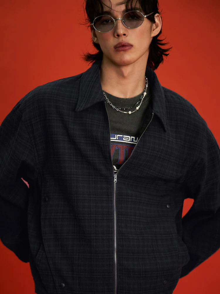 Male model wears the 8seconds Sheer Check Jacket in navy over a graphic tee, styled with sunglasses and layered chains.