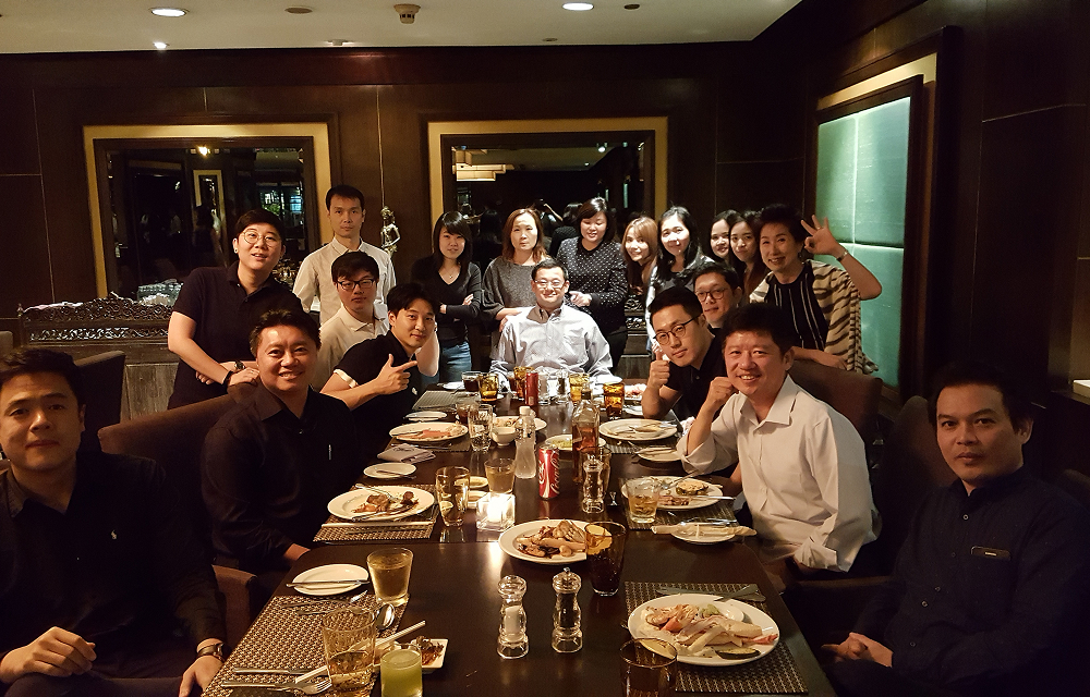 Chaimongkol Worapinpong and colleagues at a team dinner