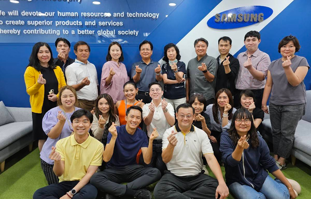 The Samsung C&T Bangkok office team gathers for a group photo at their headquarters