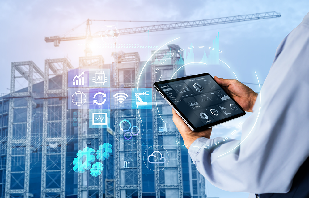 Person holding a smart device connected to sensors via IoT technology at a construction site