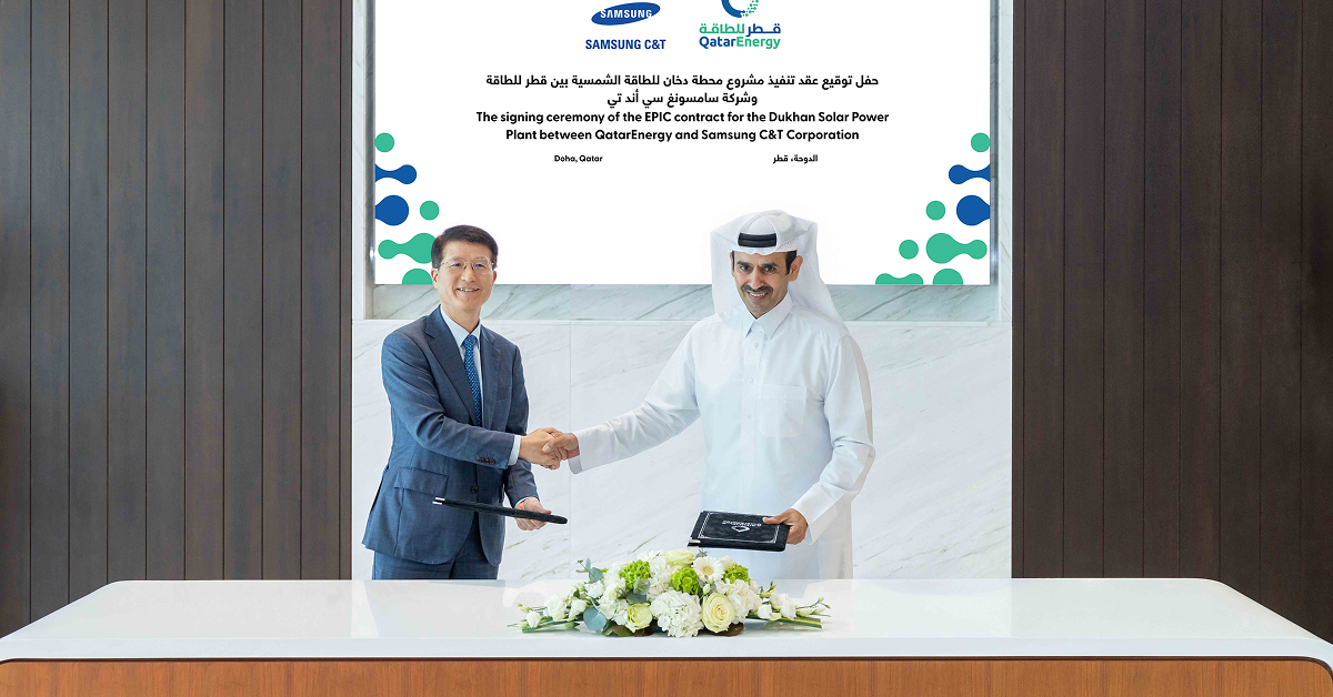 Samsung C&T CEO Se-chul Oh and QatarEnergy CEO Saad Al-Kaabi shake hands during the signing ceremony for the Dukhan Solar Power Project in Doha.