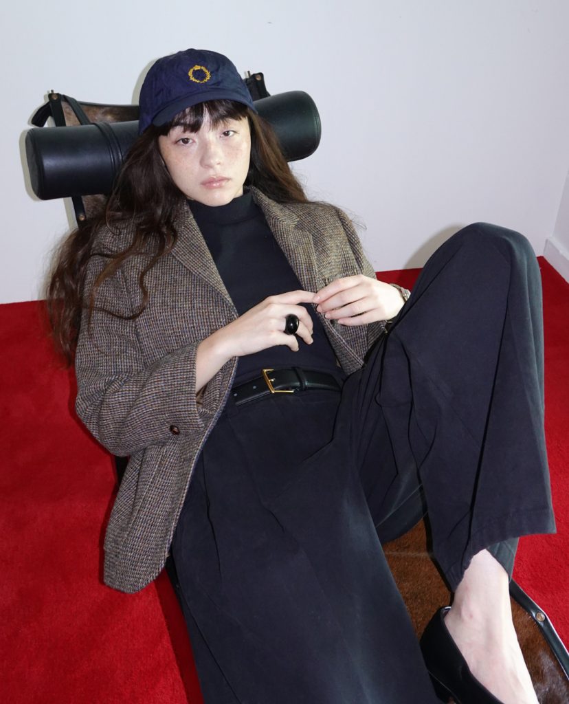 Model wearing The Aperture Harris tailored jacket paired with fluid trousers, illustrating a modern office wear look designed for both professional and everyday settings.