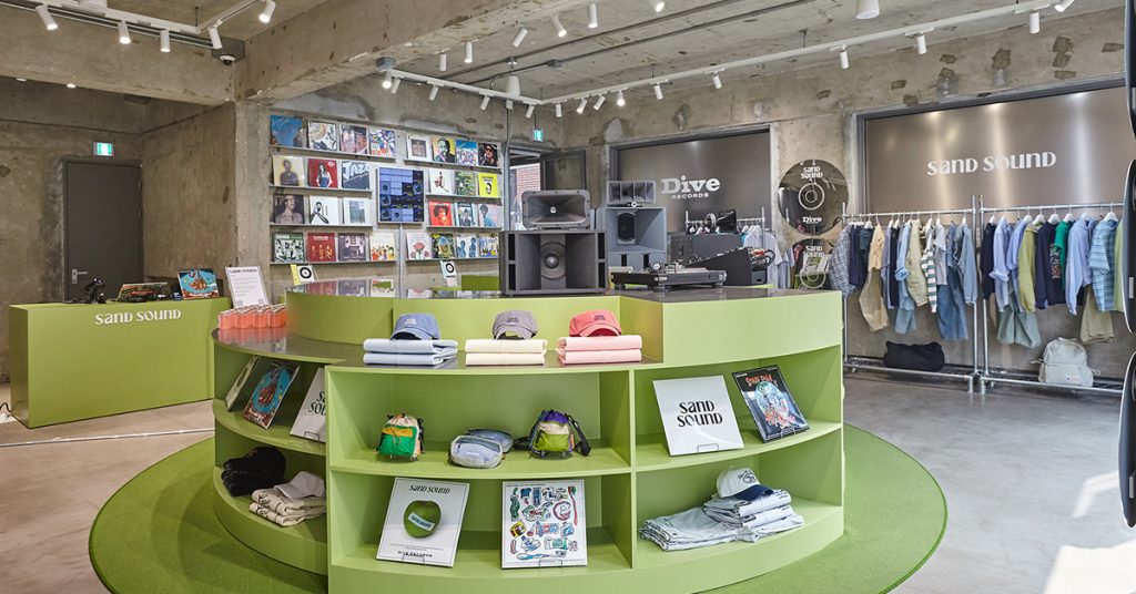Interior of SAND SOUND 26SS pop-up store in Seongsu with record displays, clothing racks, and music-inspired layout