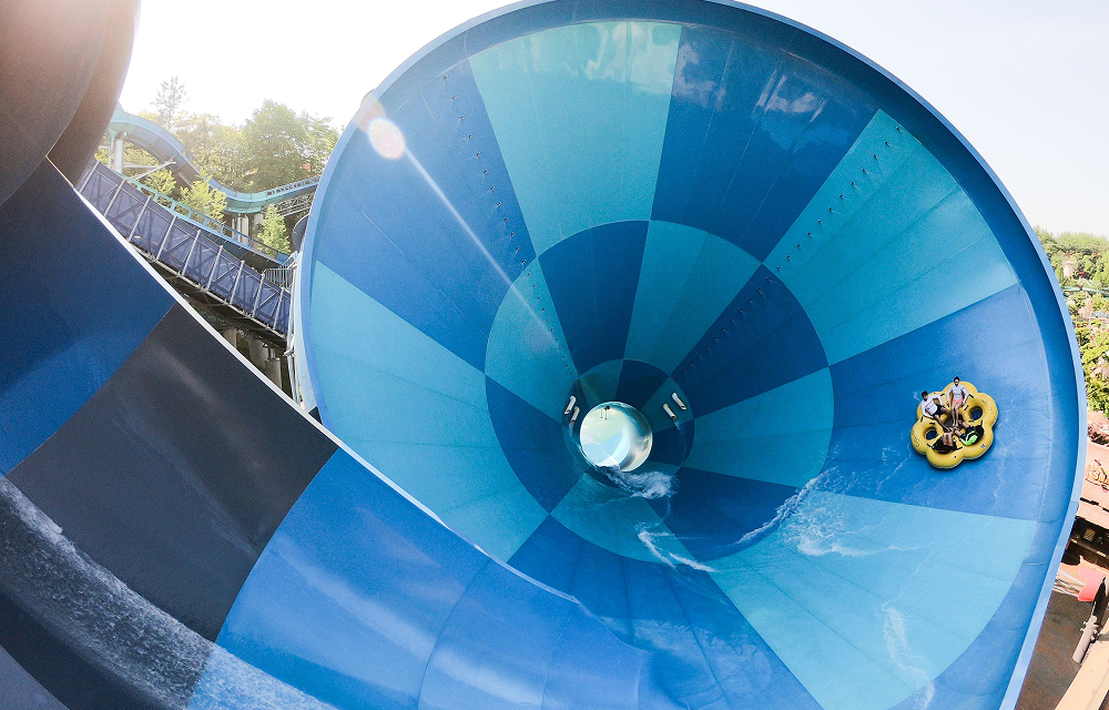 Thrill-seekers race through the iconic Mega Storm ride, one of Caribbean Bay’s most popular attractions