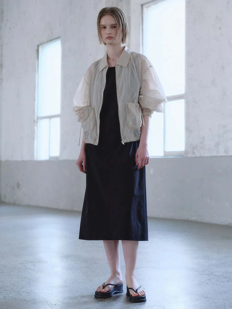 kuho plus Volume Silhouette Jumper in beige in lightweight fabric designed for versatile spring layering