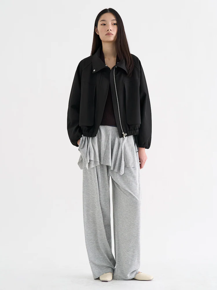 ‘anggae’ High Neck Bomber Jacket in black offers a clean, lightweight option for transitional spring styling