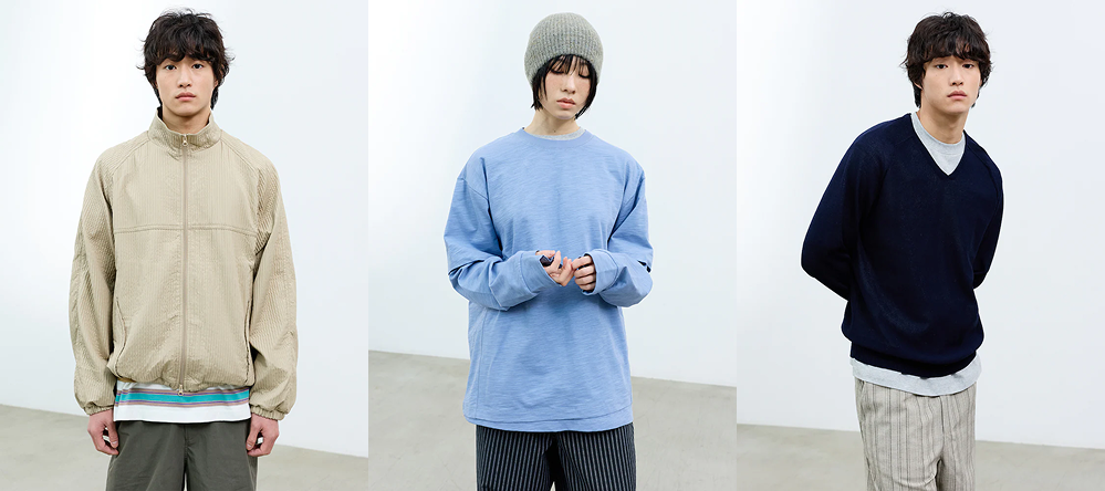 Models wearing SAND SOUND 26SS second drop outfits featuring a lightweight zip-up jacket, oversized long-sleeve T-shirt, and relaxed knit layered with casual pants in neutral and soft blue tones.