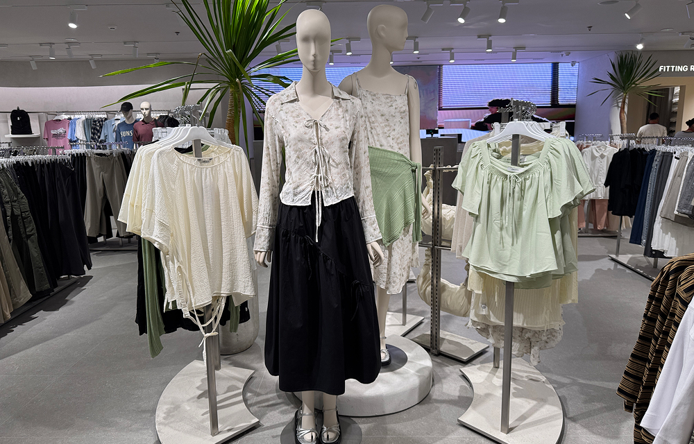 Mannequins dressed in light, pastel-toned outfits from 8seconds’ Spring/Summer 2026 collection, displayed inside the SM Megamall store in Manila