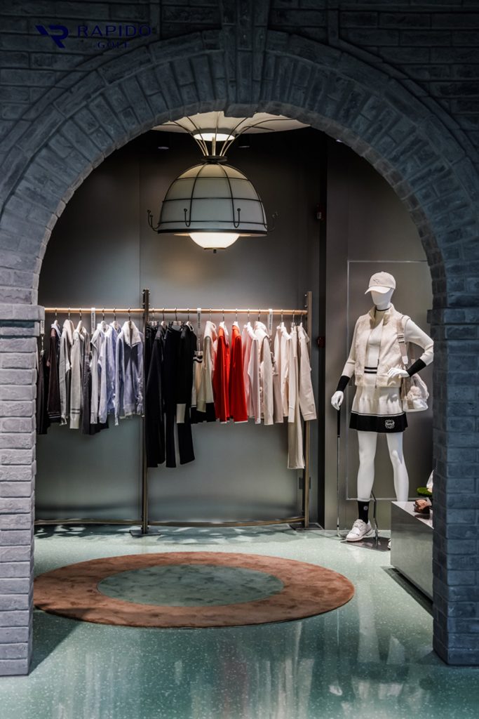 RAPIDO GOLF apparel and accessories are displayed beneath the historic brick archway inside Shangxianfang